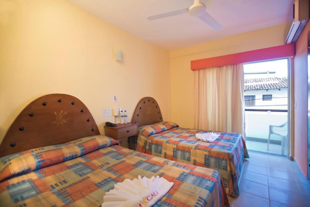 Hotel Mocali à Puerto Vallarta Chambre photo